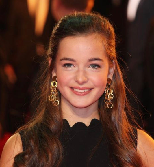 Celine Buckens wearing Laurence Coste Earrings for War Horse Premiere